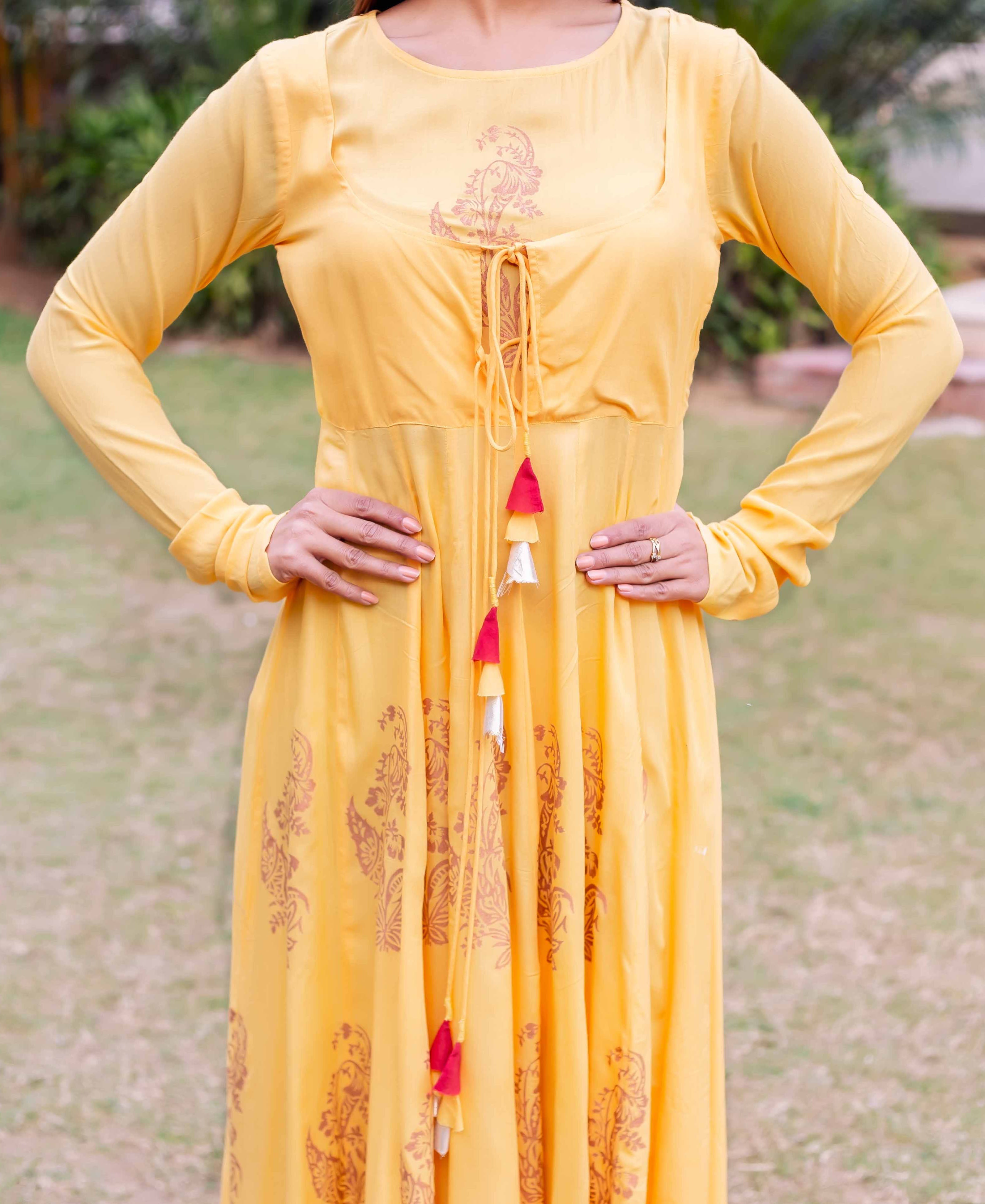 Payal Rajput radiates with grace in her elegant bright yellow Anarkali suit