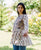 White and Brown Printed Peplum Top