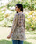 White and Brown Printed Peplum Top